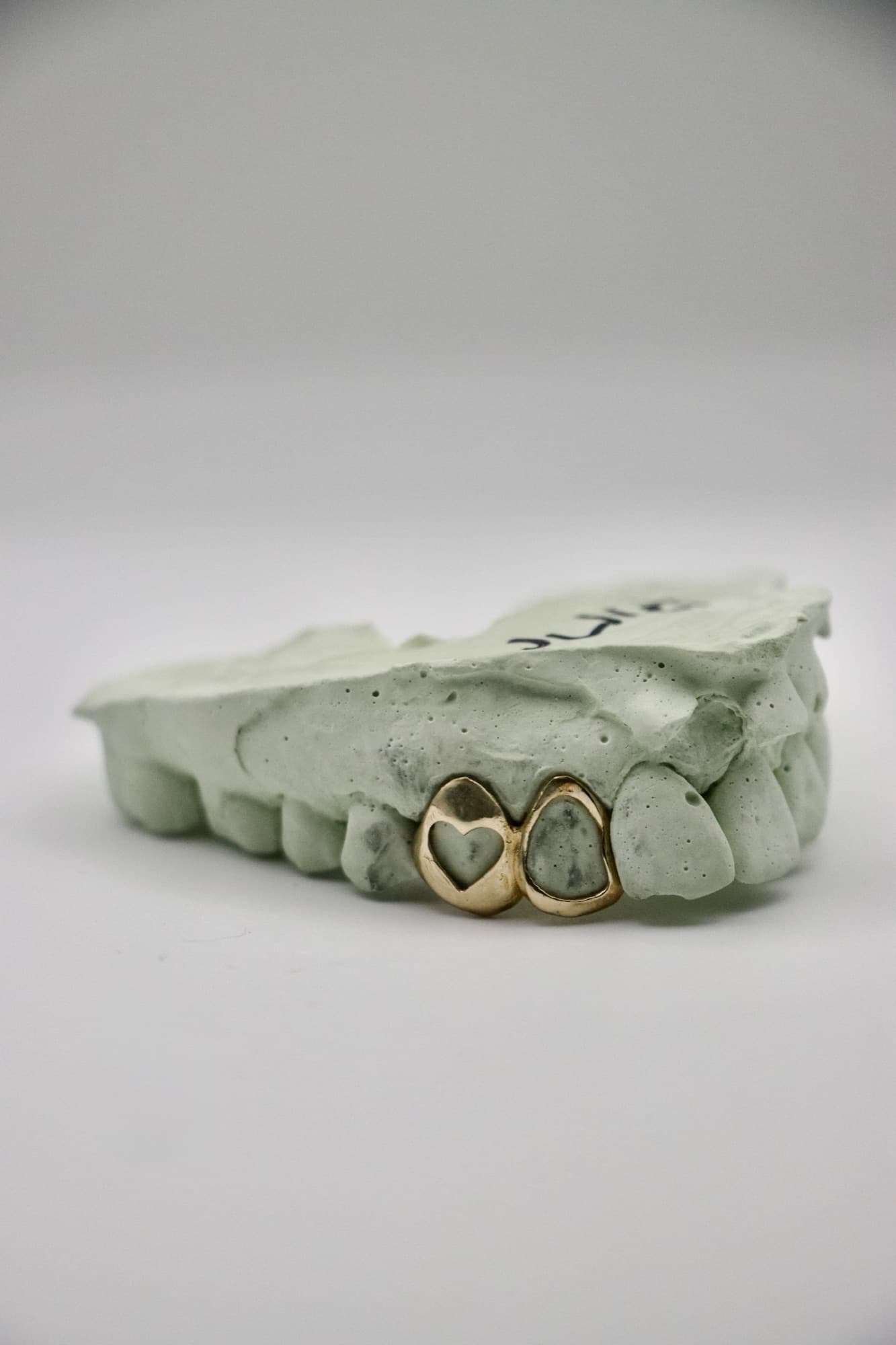 Gold pair with a heart cutout and open face